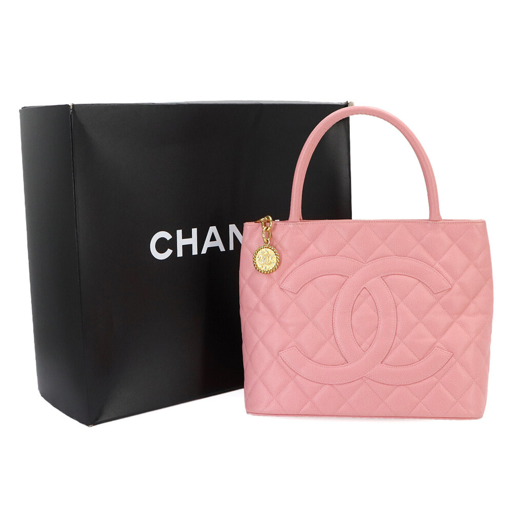 Chanel Medallion Tote Bag, a reissue of classic design, made caviar leather i...